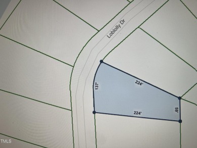 This .51 acres is located in the gated Woodlake Country Club on Woodlake Country Club in North Carolina - for sale on GolfHomes.com, golf home, golf lot