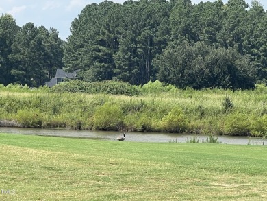 This .51 acres is located in the gated Woodlake Country Club on Woodlake Country Club in North Carolina - for sale on GolfHomes.com, golf home, golf lot