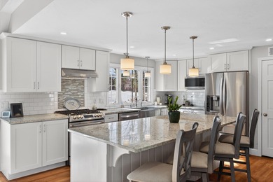 Inviting Cape Cod home designed with entertaining in mind. A on Holly Ridge Golf Club in Massachusetts - for sale on GolfHomes.com, golf home, golf lot