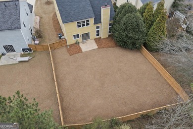 Lovely home in a prime Johns Creek location, tucked in an active on The Standard Club in Georgia - for sale on GolfHomes.com, golf home, golf lot