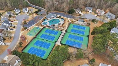 Lovely home in a prime Johns Creek location, tucked in an active on The Standard Club in Georgia - for sale on GolfHomes.com, golf home, golf lot