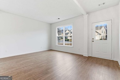 Lovely home in a prime Johns Creek location, tucked in an active on The Standard Club in Georgia - for sale on GolfHomes.com, golf home, golf lot