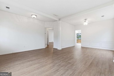 Lovely home in a prime Johns Creek location, tucked in an active on The Standard Club in Georgia - for sale on GolfHomes.com, golf home, golf lot