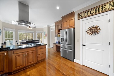 Discover exceptional living on the 14th fairway in sought -after on Oak Valley Golf Club in North Carolina - for sale on GolfHomes.com, golf home, golf lot