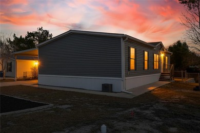 Welcome home to this beautifully maintained 2022 manufactured on Brookridge Country Club in Florida - for sale on GolfHomes.com, golf home, golf lot