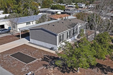 Welcome home to this beautifully maintained 2022 manufactured on Brookridge Country Club in Florida - for sale on GolfHomes.com, golf home, golf lot