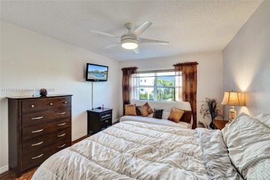 Step into this fully furnished two bedroom apartment just on The Diplomat Golf Resort and Spa in Florida - for sale on GolfHomes.com, golf home, golf lot
