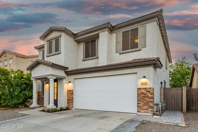 Spacious two-story home in the desirable Johnson Ranch golf on The Golf Club At Johnson Ranch in Arizona - for sale on GolfHomes.com, golf home, golf lot