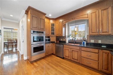 Discover exceptional living on the 14th fairway in sought -after on Oak Valley Golf Club in North Carolina - for sale on GolfHomes.com, golf home, golf lot