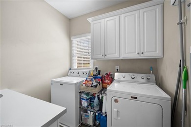 Discover exceptional living on the 14th fairway in sought -after on Oak Valley Golf Club in North Carolina - for sale on GolfHomes.com, golf home, golf lot