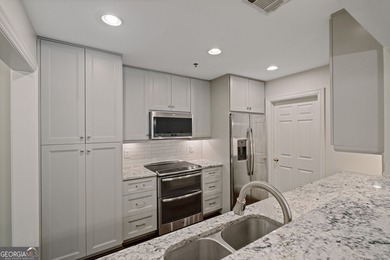 Experience refined city living in this beautifully renovated on Bobby Jones Golf Club in Georgia - for sale on GolfHomes.com, golf home, golf lot