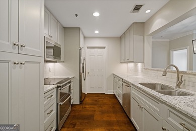 Experience refined city living in this beautifully renovated on Bobby Jones Golf Club in Georgia - for sale on GolfHomes.com, golf home, golf lot