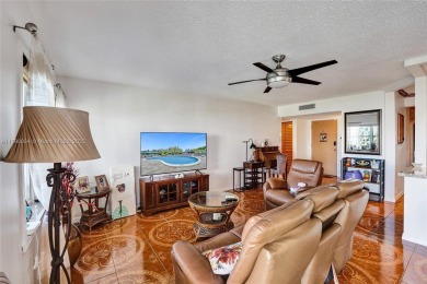 Step into this fully furnished two bedroom apartment just on The Diplomat Golf Resort and Spa in Florida - for sale on GolfHomes.com, golf home, golf lot