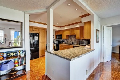 Step into this fully furnished two bedroom apartment just on The Diplomat Golf Resort and Spa in Florida - for sale on GolfHomes.com, golf home, golf lot