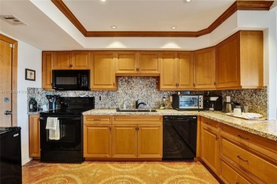 Step into this fully furnished two bedroom apartment just on The Diplomat Golf Resort and Spa in Florida - for sale on GolfHomes.com, golf home, golf lot