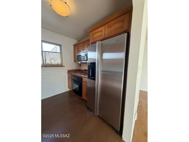 Beautifully updated downstairs unit in Central Tucson featuring on Randolph Park Golf Courses in Arizona - for sale on GolfHomes.com, golf home, golf lot