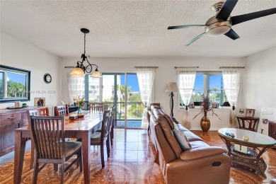 Step into this fully furnished two bedroom apartment just on The Diplomat Golf Resort and Spa in Florida - for sale on GolfHomes.com, golf home, golf lot