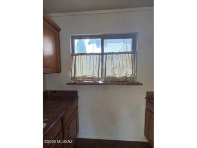 Beautifully updated downstairs unit in Central Tucson featuring on Randolph Park Golf Courses in Arizona - for sale on GolfHomes.com, golf home, golf lot