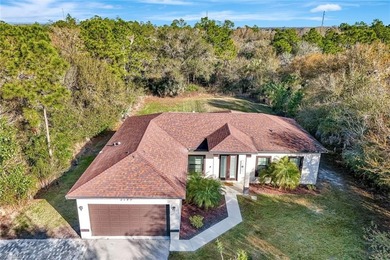 Set back on a private 1.14-acre lot, this beautifully designed on The Club At Twin Eagles in Florida - for sale on GolfHomes.com, golf home, golf lot