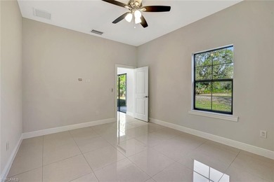 Set back on a private 1.14-acre lot, this beautifully designed on The Club At Twin Eagles in Florida - for sale on GolfHomes.com, golf home, golf lot