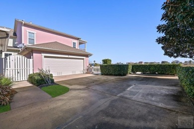 This beautiful corner townhome is one of only three in Evia with on Moody Gardens Golf Course in Texas - for sale on GolfHomes.com, golf home, golf lot