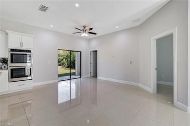 Set back on a private 1.14-acre lot, this beautifully designed on The Club At Twin Eagles in Florida - for sale on GolfHomes.com, golf home, golf lot