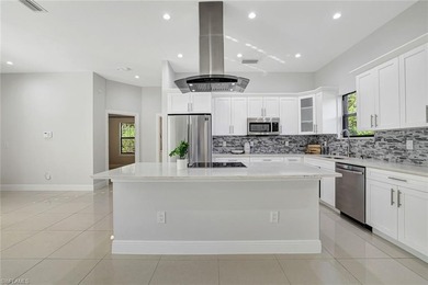 Set back on a private 1.14-acre lot, this beautifully designed on The Club At Twin Eagles in Florida - for sale on GolfHomes.com, golf home, golf lot