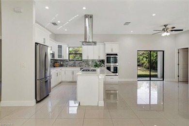 Set back on a private 1.14-acre lot, this beautifully designed on The Club At Twin Eagles in Florida - for sale on GolfHomes.com, golf home, golf lot