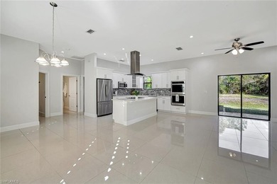 Set back on a private 1.14-acre lot, this beautifully designed on The Club At Twin Eagles in Florida - for sale on GolfHomes.com, golf home, golf lot