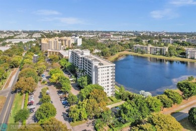 Discover your dream home in this beautiful 2BR, 2BA condo on Palm-Aire Country Club and Resort - Palms in Florida - for sale on GolfHomes.com, golf home, golf lot