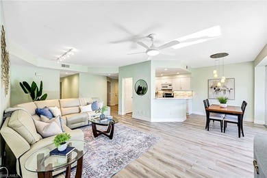 Wake up to tranquil south-facing lake views in this beautifully on Bonita Bay West in Florida - for sale on GolfHomes.com, golf home, golf lot