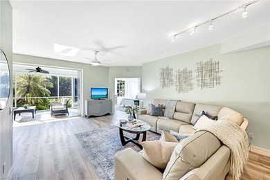 Wake up to tranquil south-facing lake views in this beautifully on Bonita Bay West in Florida - for sale on GolfHomes.com, golf home, golf lot