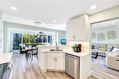 Wake up to tranquil south-facing lake views in this beautifully on Bonita Bay West in Florida - for sale on GolfHomes.com, golf home, golf lot