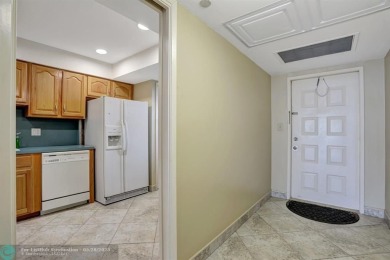 Discover your dream home in this beautiful 2BR, 2BA condo on Palm-Aire Country Club and Resort - Palms in Florida - for sale on GolfHomes.com, golf home, golf lot