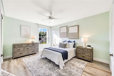 Wake up to tranquil south-facing lake views in this beautifully on Bonita Bay West in Florida - for sale on GolfHomes.com, golf home, golf lot