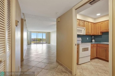 Discover your dream home in this beautiful 2BR, 2BA condo on Palm-Aire Country Club and Resort - Palms in Florida - for sale on GolfHomes.com, golf home, golf lot