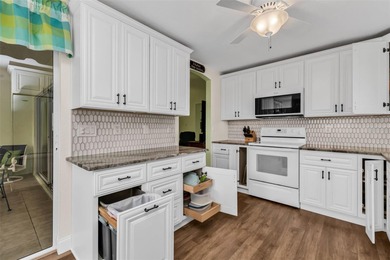 NICELY UPDATED and VERY WELL MAINTAINED Sheffield model with on Kings Gate Golf Club in Florida - for sale on GolfHomes.com, golf home, golf lot