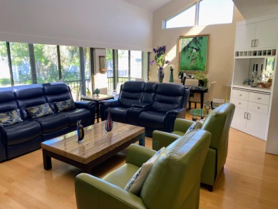 A 2nd floor experience offering stunning water views, great room on Boca West Golf and Country Club in Florida - for sale on GolfHomes.com, golf home, golf lot