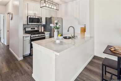 This modern, open-concept residence at Sunrise offers a sleek on Ewa Villages Golf Course in Hawaii - for sale on GolfHomes.com, golf home, golf lot