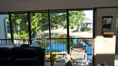 A 2nd floor experience offering stunning water views, great room on Boca West Golf and Country Club in Florida - for sale on GolfHomes.com, golf home, golf lot