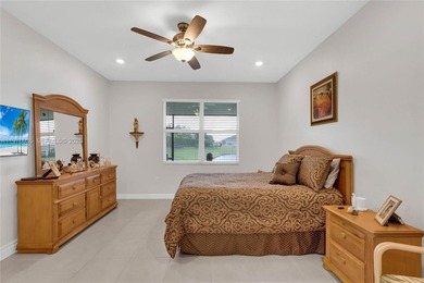 Beautifully maintained home in a sought-after 55+ gated on The Tesoro Golf Course and Club in Florida - for sale on GolfHomes.com, golf home, golf lot