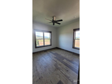 This beautiful, spacious  new construction boasts vaulted on Council Mountain Golf Course in Idaho - for sale on GolfHomes.com, golf home, golf lot