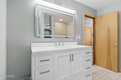 This turnkey, well-maintained home features a new kitchen, new on The Hideout Golf in Pennsylvania - for sale on GolfHomes.com, golf home, golf lot