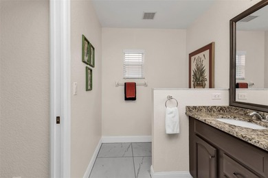 NICELY UPDATED and VERY WELL MAINTAINED Sheffield model with on Kings Gate Golf Club in Florida - for sale on GolfHomes.com, golf home, golf lot