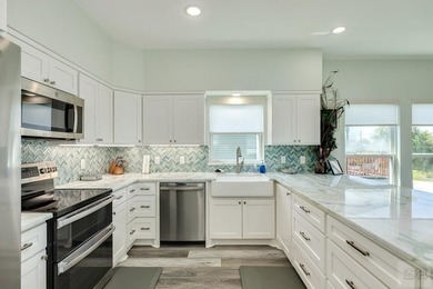 Pirates Cove cottage overlooking the preserve and natural on Galveston Country Club in Texas - for sale on GolfHomes.com, golf home, golf lot