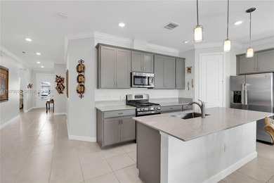 Beautifully maintained home in a sought-after 55+ gated on The Tesoro Golf Course and Club in Florida - for sale on GolfHomes.com, golf home, golf lot