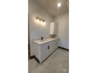 This beautiful, spacious  new construction boasts vaulted on Council Mountain Golf Course in Idaho - for sale on GolfHomes.com, golf home, golf lot