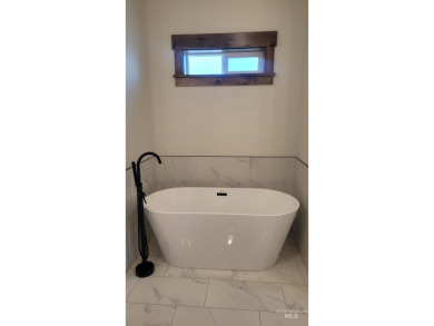 This beautiful, spacious  new construction boasts vaulted on Council Mountain Golf Course in Idaho - for sale on GolfHomes.com, golf home, golf lot