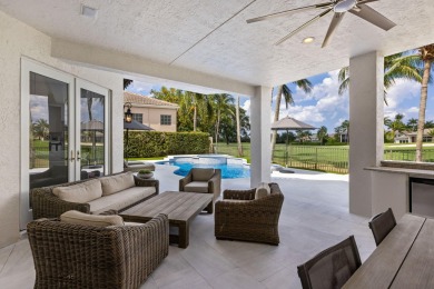 Experience unparalleled luxury in this modern masterpiece on Woodfield Country Club in Florida - for sale on GolfHomes.com, golf home, golf lot