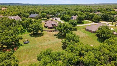 Live the life you've imagined. This spectacular home nestled in on Pecan Plantation Country Club in Texas - for sale on GolfHomes.com, golf home, golf lot